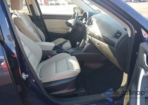 2014 Mazda Cx-5 Touring z USA, uszkodzony, nr VIN JM3KE2CYXE0322196